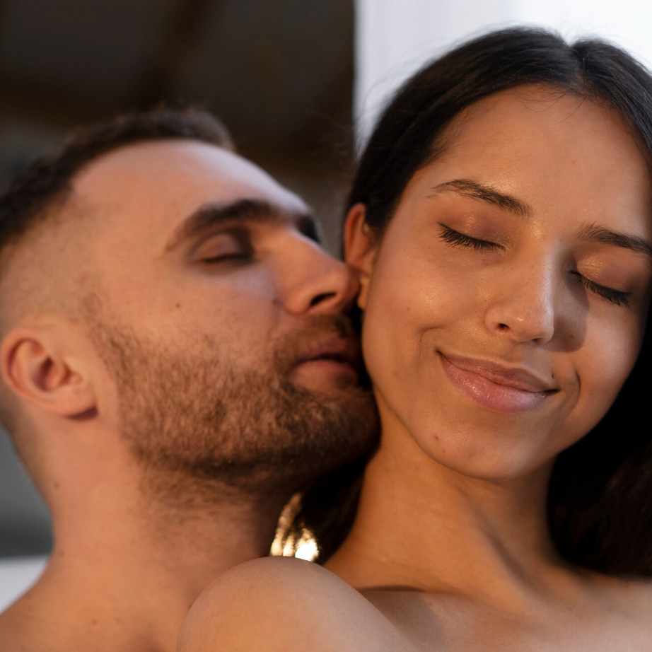 Man and woman sharing intimate skin to skin moment