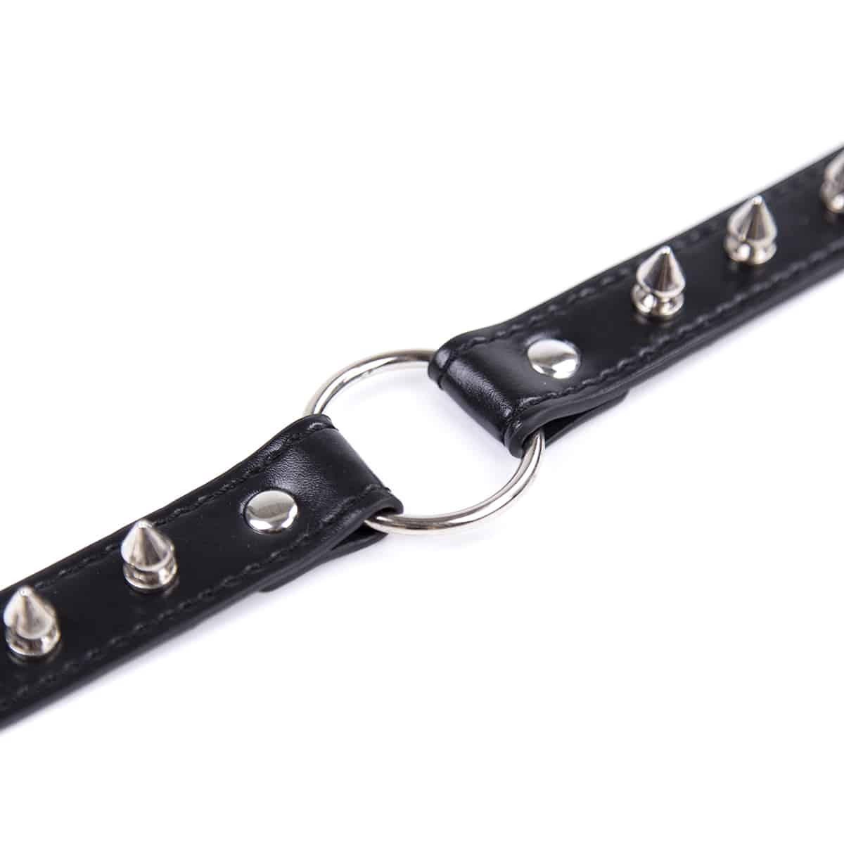 Black short spiked leather collar with circular metal accents from Ideal Leather, featuring a sturdy buckle and bold design.