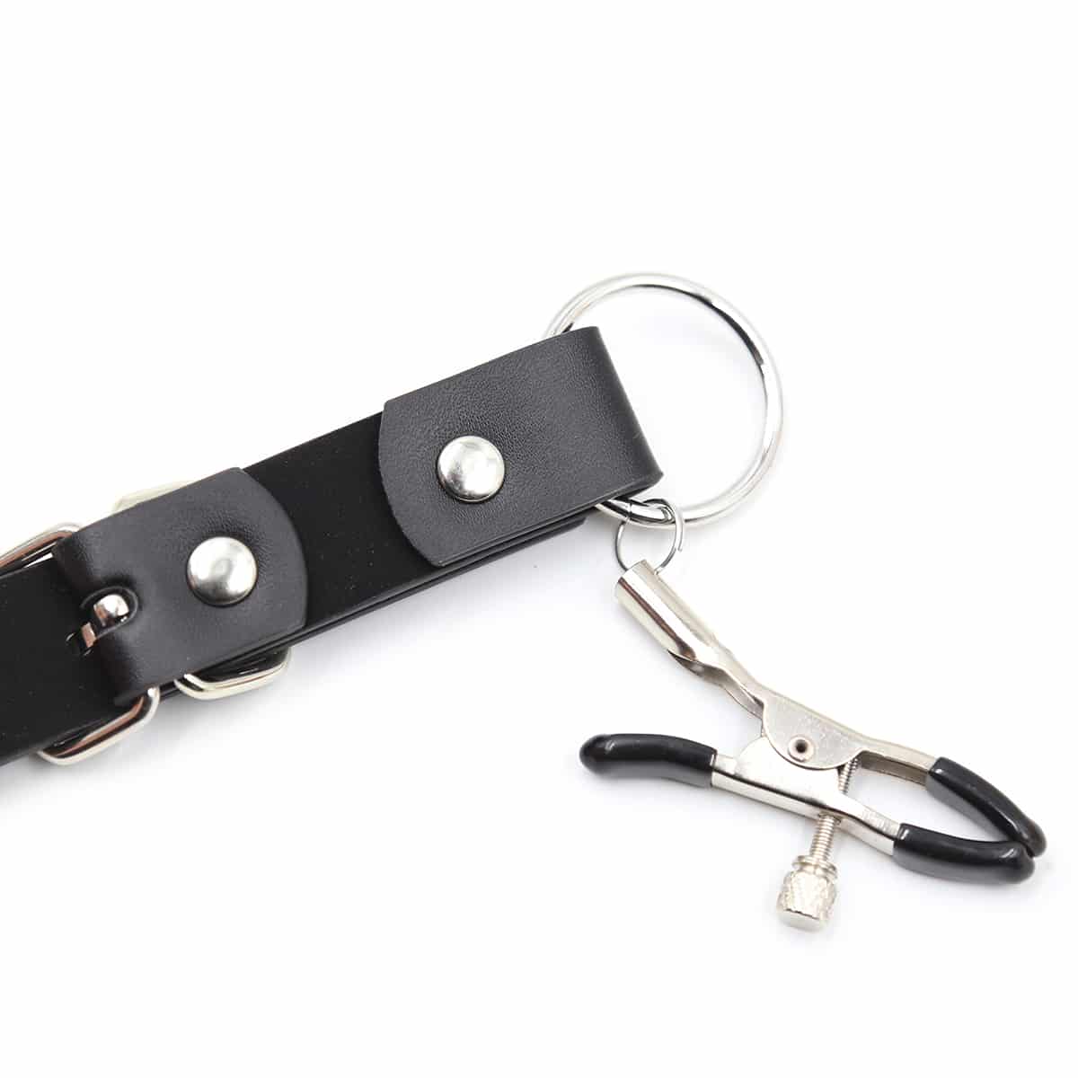Ideal Leather labia spreader harness with adjustable straps and metal rings, designed for intimate restraint and exploration.