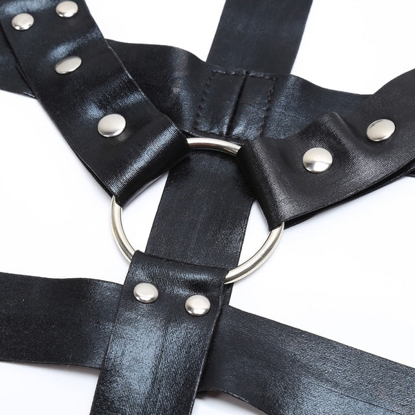 Black full body harness by Ideal Leather with adjustable straps and secure buckles, designed for safety and comfort.