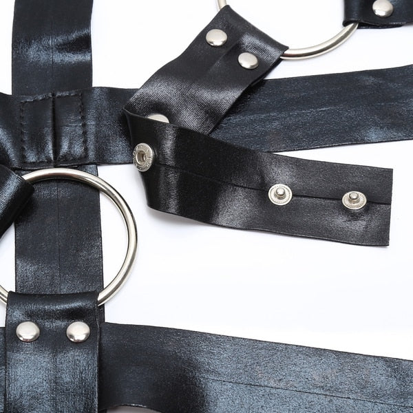 Black full body harness from Ideal Leather, featuring adjustable straps and sturdy hardware for secure wear.