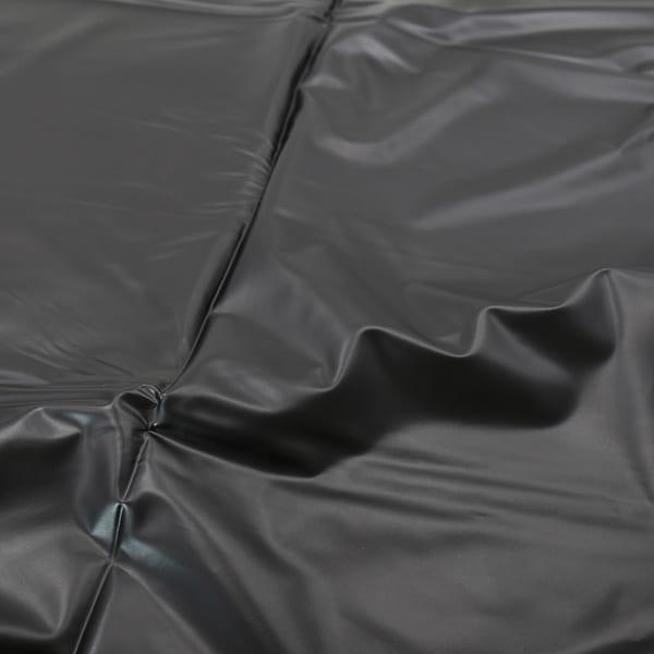 Black leather bed sling by Ideal Leather, showcasing its sturdy design and adjustable straps for secure support.