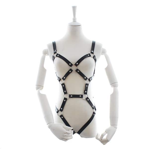 Black women's body harness with a pentagon pattern from Ideal Leather, featuring adjustable straps and metal hardware.