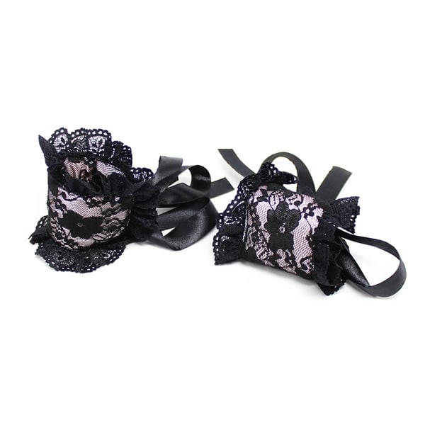 Luvland satin blindfold and cuffs set with soft fabric and adjustable straps, designed for comfortable, stylish restraint.
