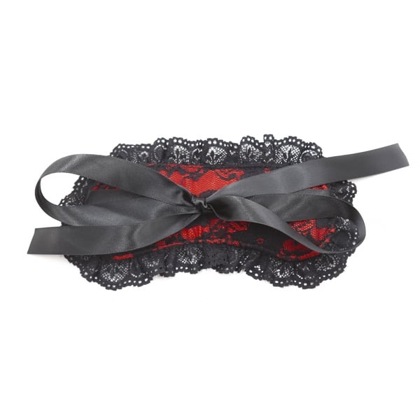 Luvland satin blindfold and cuffs set with soft fabric and adjustable straps for comfortable sensory play.