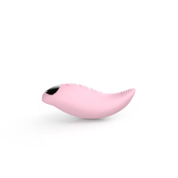 Wonderland Luna rechargeable light in soft pink with sleek design, ideal for ambient lighting or decorative use.