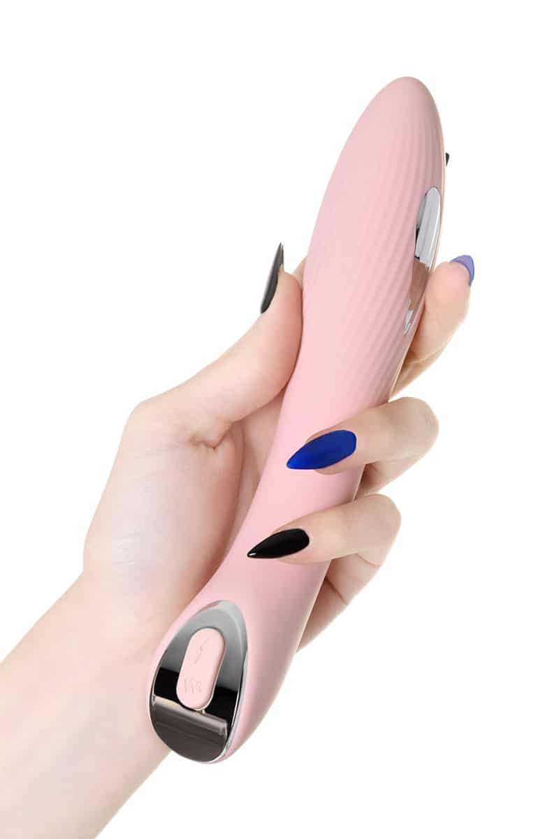 Pink Physics Tesla G-Point Luvland toy with sleek design and vibrant color, shown on a plain background.