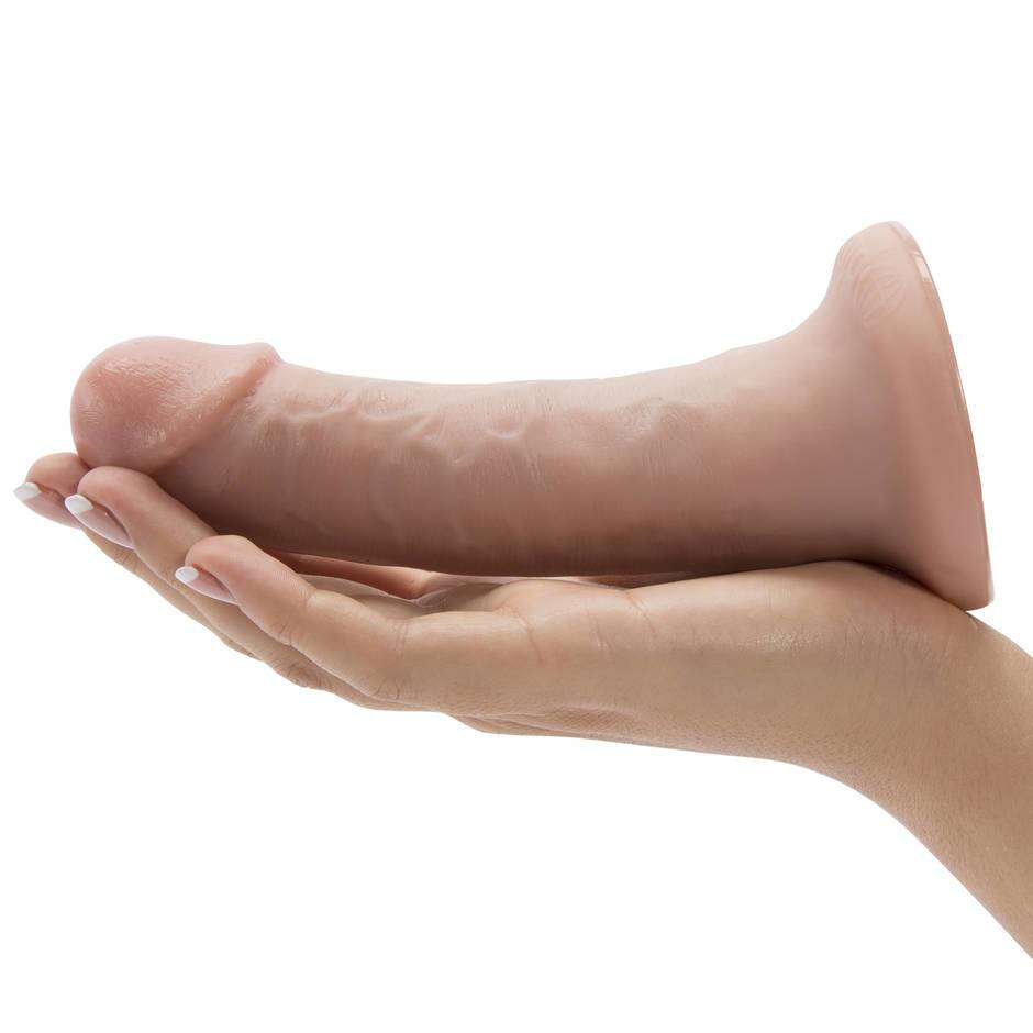 Tan King Cock strap-on harness with 6-inch (15cm) dildo from Pipedream, featuring adjustable straps and realistic design.