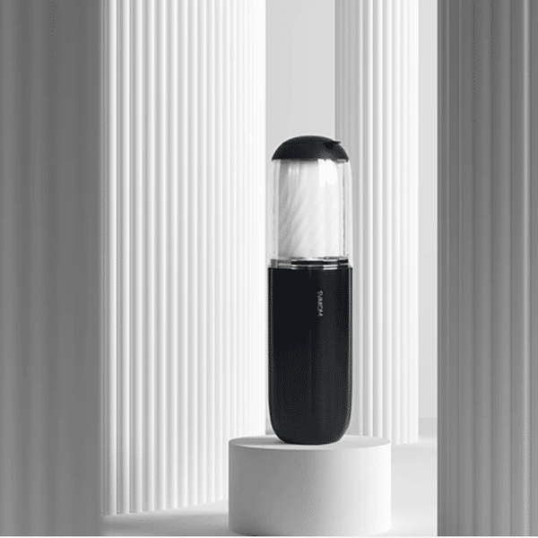 Dark blue Svakom Alex Neo 2 vibrator with ergonomic design and textured surface, shown in a close-up shot.