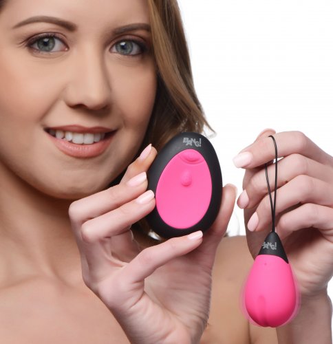 XR Bang Ultra Powerful Rechargeable Egg in pink, showing its compact, sleek design with control buttons and charging port.