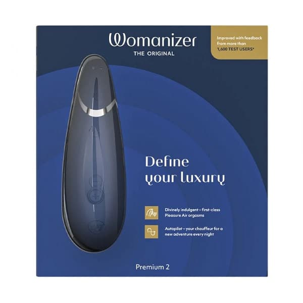 Womanizer Premium 2 personal massager in deep blue, featuring ergonomic design and smooth exterior for intimate pleasure.