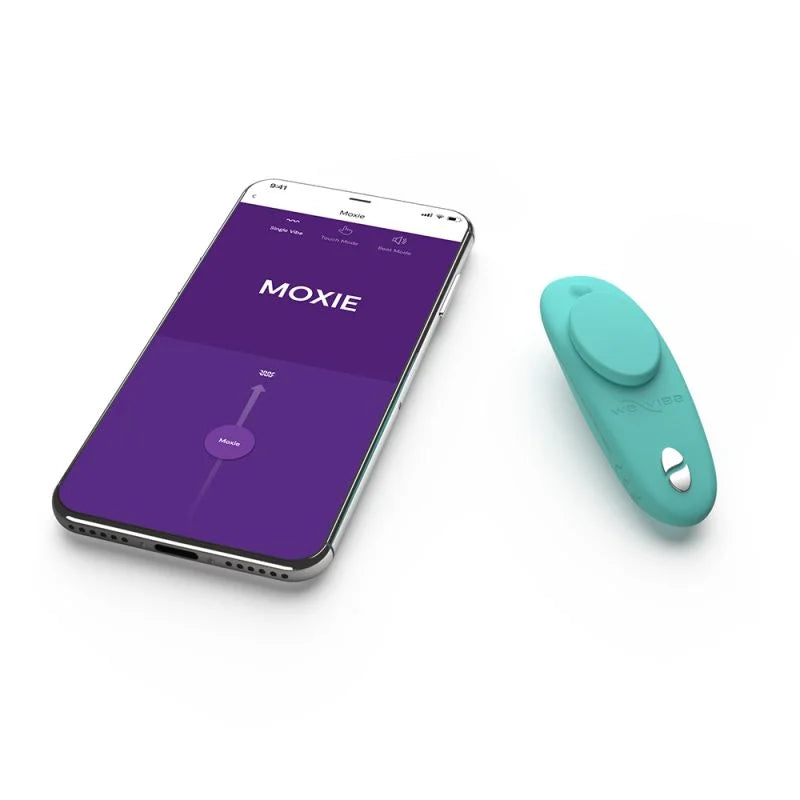 Luvland We Vibe Moxie and clitoral stimulator in aqua color, compact design with flexible silicone material and textured surface.