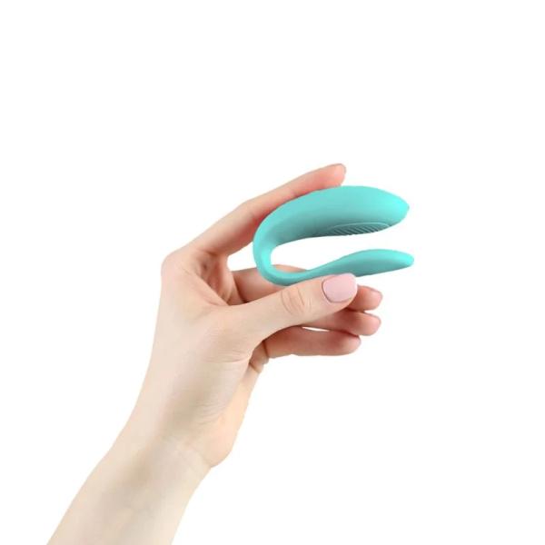Luvland We Vibe Sync Lite in aqua, a couples vibrator with adjustable settings and ergonomic design visible in the image.