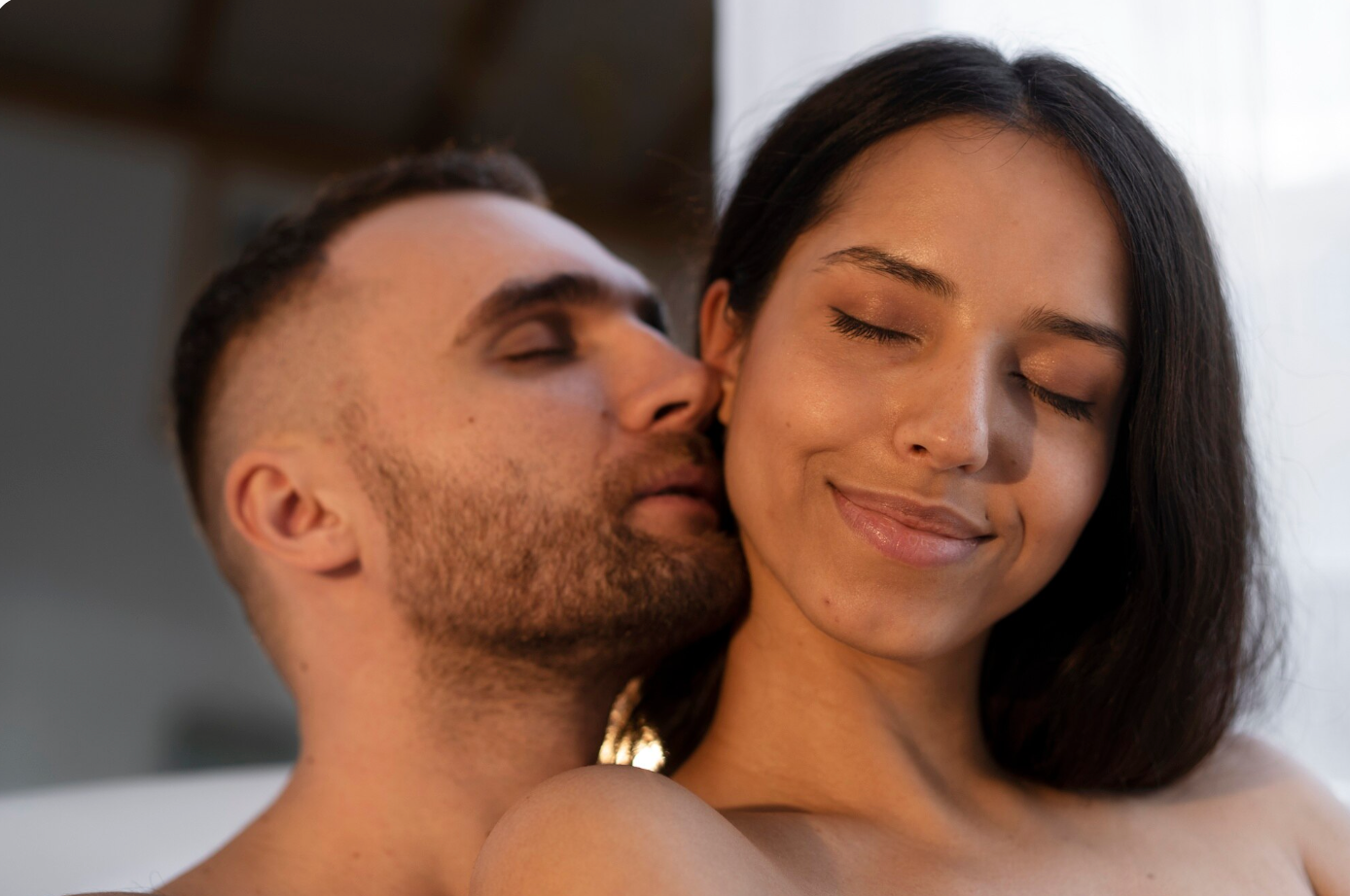 Man and woman sharing intimate skin to skin moment 