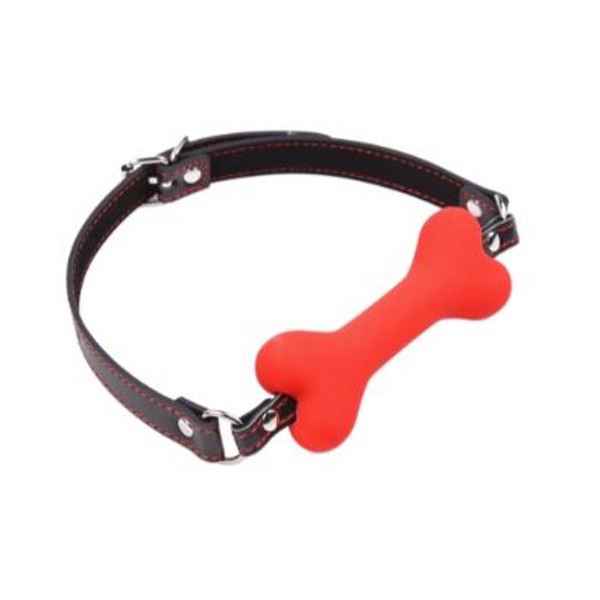 Red bone gag with black leather strap, adjustable BDSM restraint from Ideal Leather, shown on a white background.