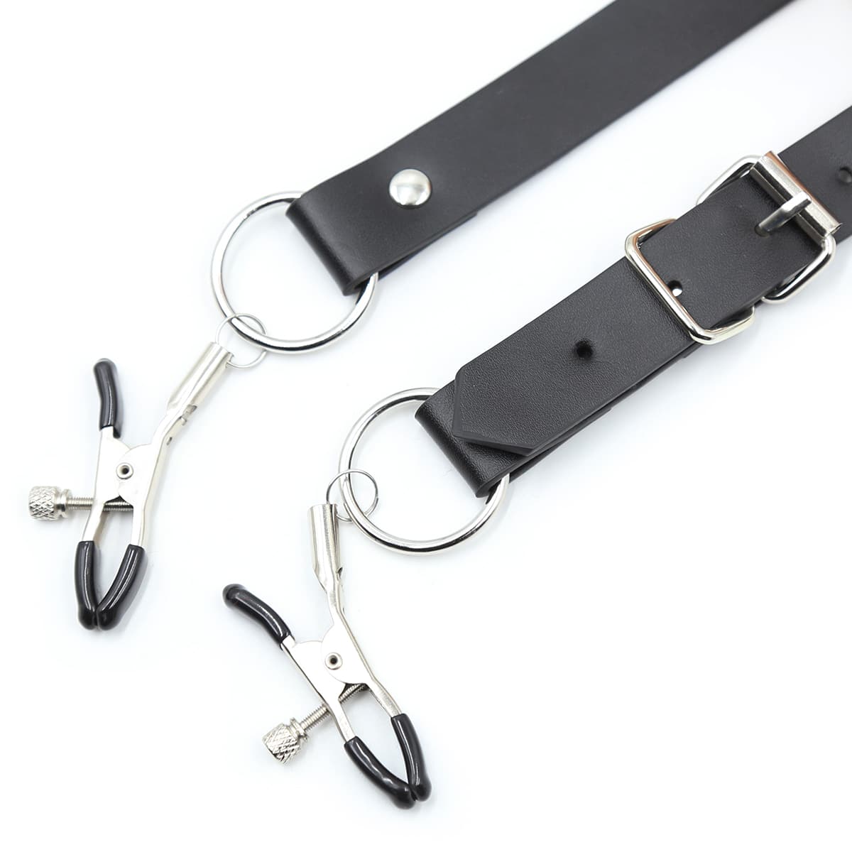 Ideal Leather labia spreader harness with adjustable straps and metal hardware, designed for intimate bondage exploration.