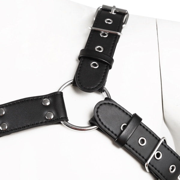 Black 4-strap body harness by Ideal Leather featuring adjustable straps and metal hardware for a stylish, bold look.