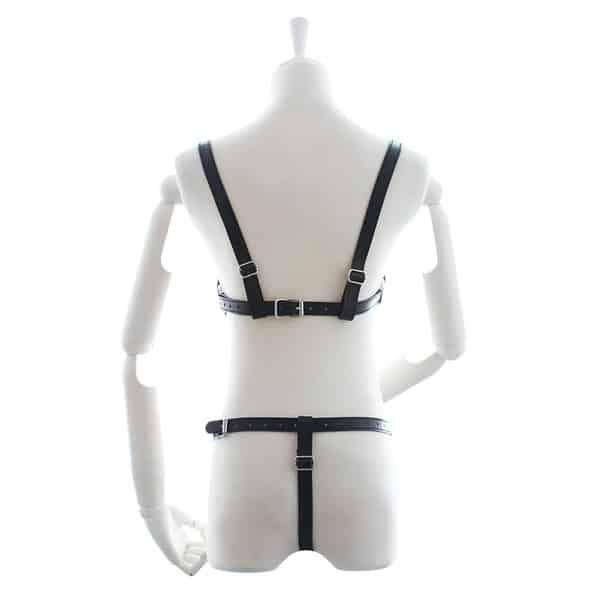 Black women's body harness with a pentagon pattern by Ideal Leather, featuring adjustable straps and a fashionable design.