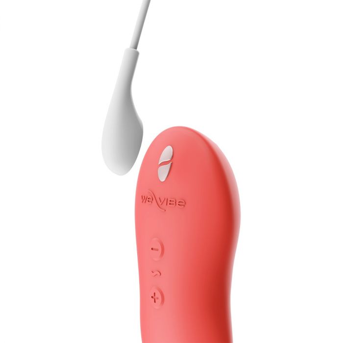 Luvland We Vibe Touch X Coral personal massager with smooth, ergonomic design and vibrant coral color for intimate use