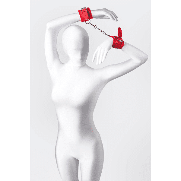Red Anonymo Wrist Cuffs by Toyfa, made of soft fabric with adjustable straps and metal hardware, designed for adult role-play accessories.