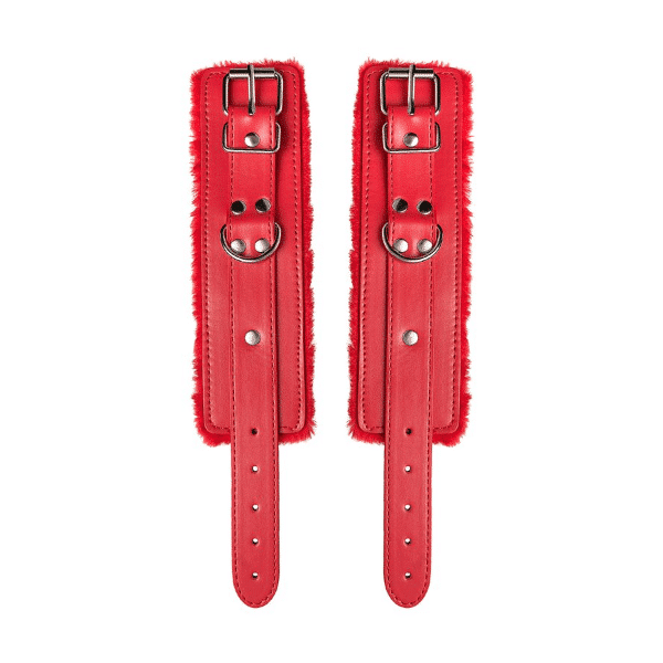 Red Anonymo wrist cuffs by Toyfa, featuring adjustable straps and metal hardware for BDSM restraint play.