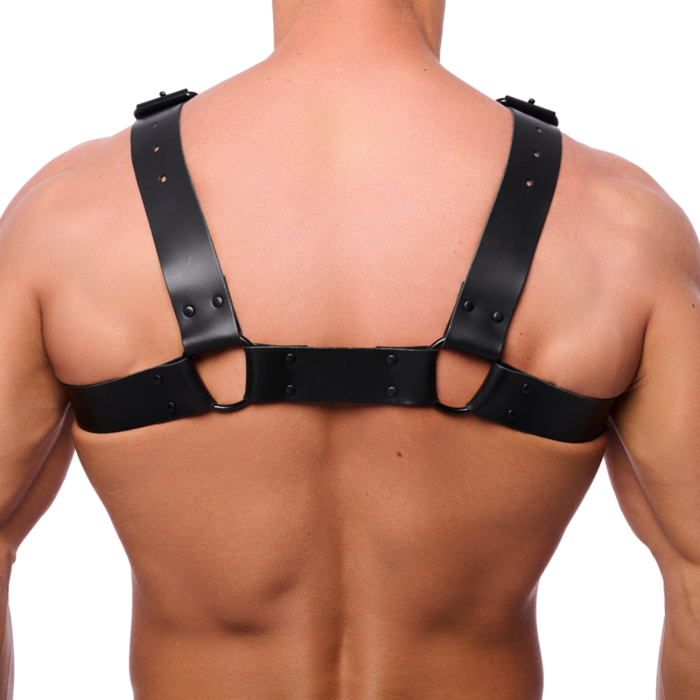 Black leather Bulldog harness by Luvland featuring adjustable straps and metal hardware for a snug fit.