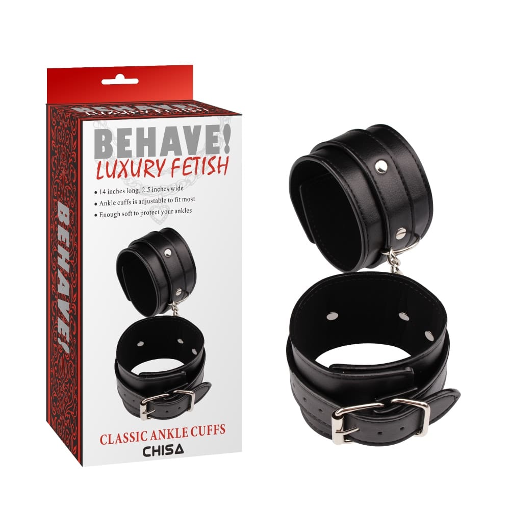 Luvland Behave! Classic Ankle Cuffs in black leather with metal buckle closures and adjustable straps.