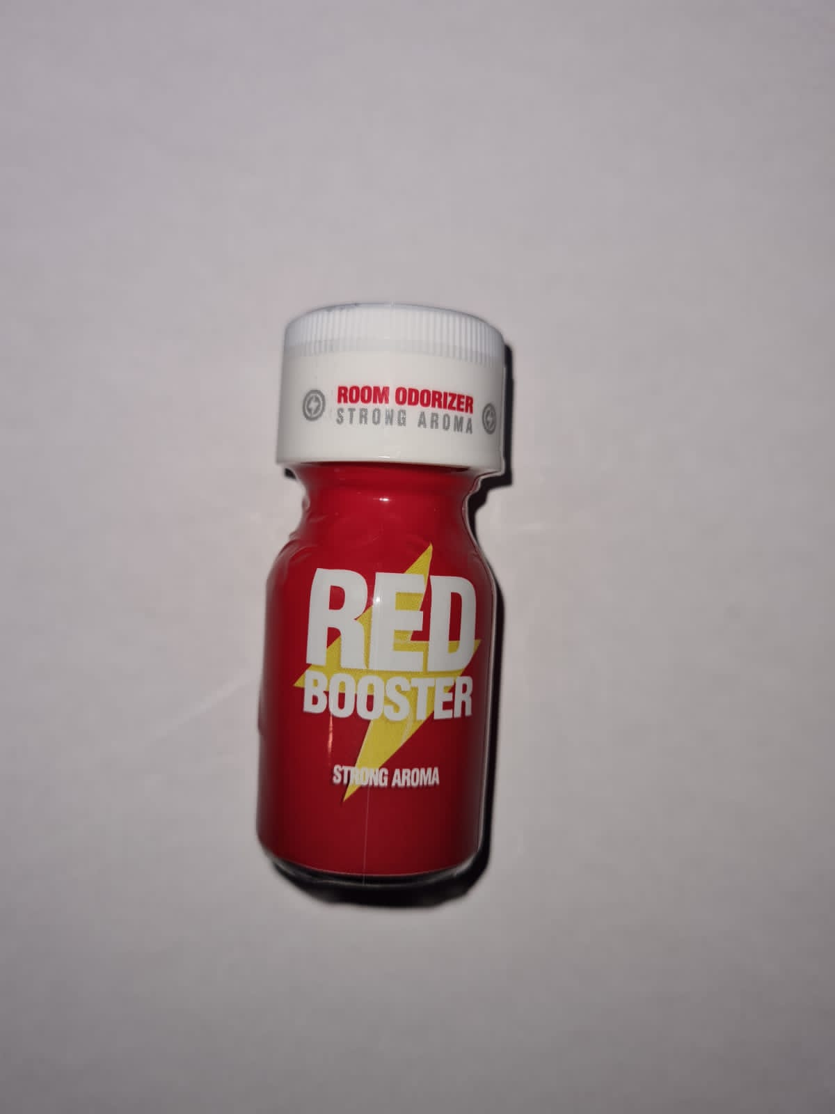 Luvland JOLT Red Booster energy drink in a sleek red can with vibrant branding and modern design.