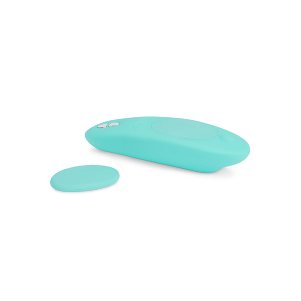 Luvland We Vibe Moxie panty vibrator and clitoral stimulator in black, shown in use with discreet design and adjustable fit.
