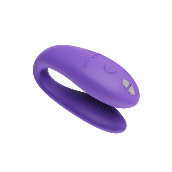 We Vibe Sync Go in purple, a wearable couples vibrator with flexible dual motors and adjustable fit for shared pleasure.